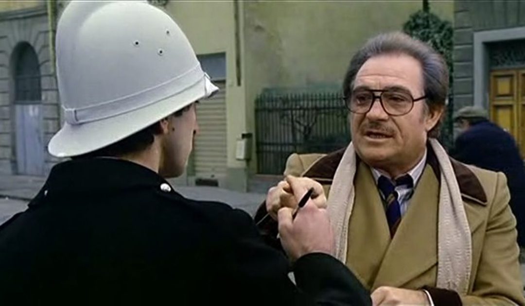 Ugo Tognazzi durante la scena della "Supercazzola" al vigile in Amici Miei