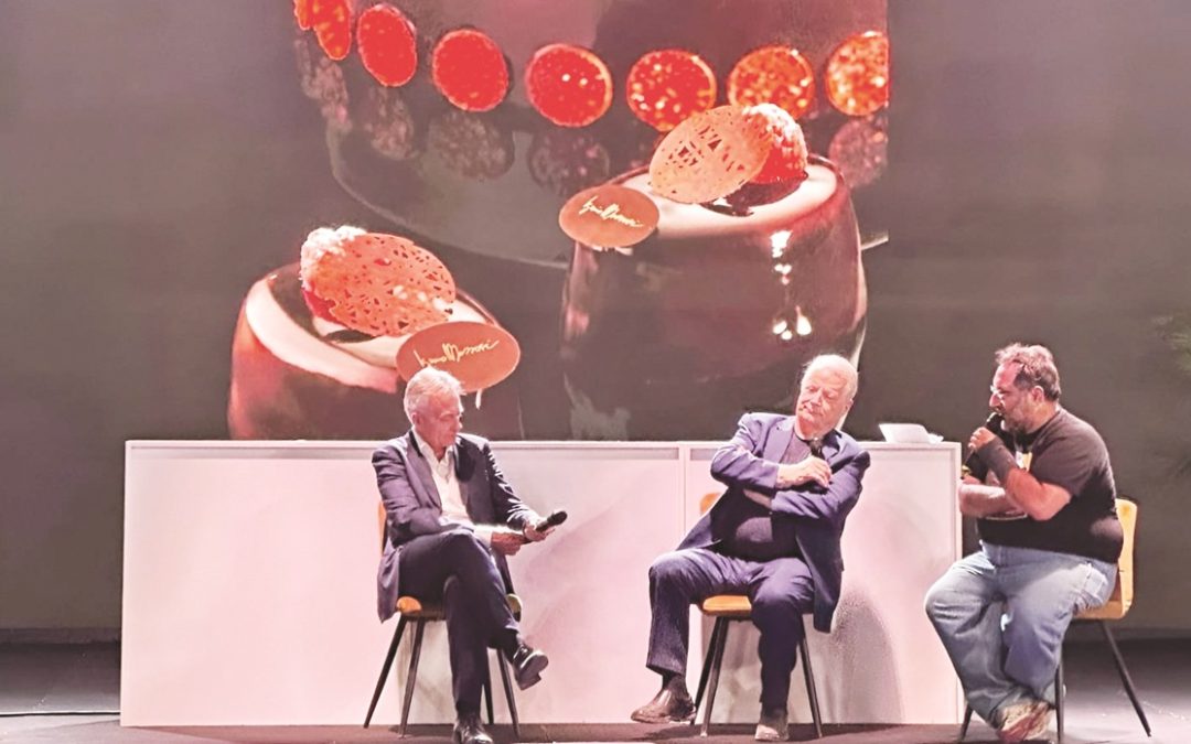 L’assessore regionale Gianluca Gallo, il maestro Iginio Massari e Peppone e sullo sfondo la torta al peperoncino