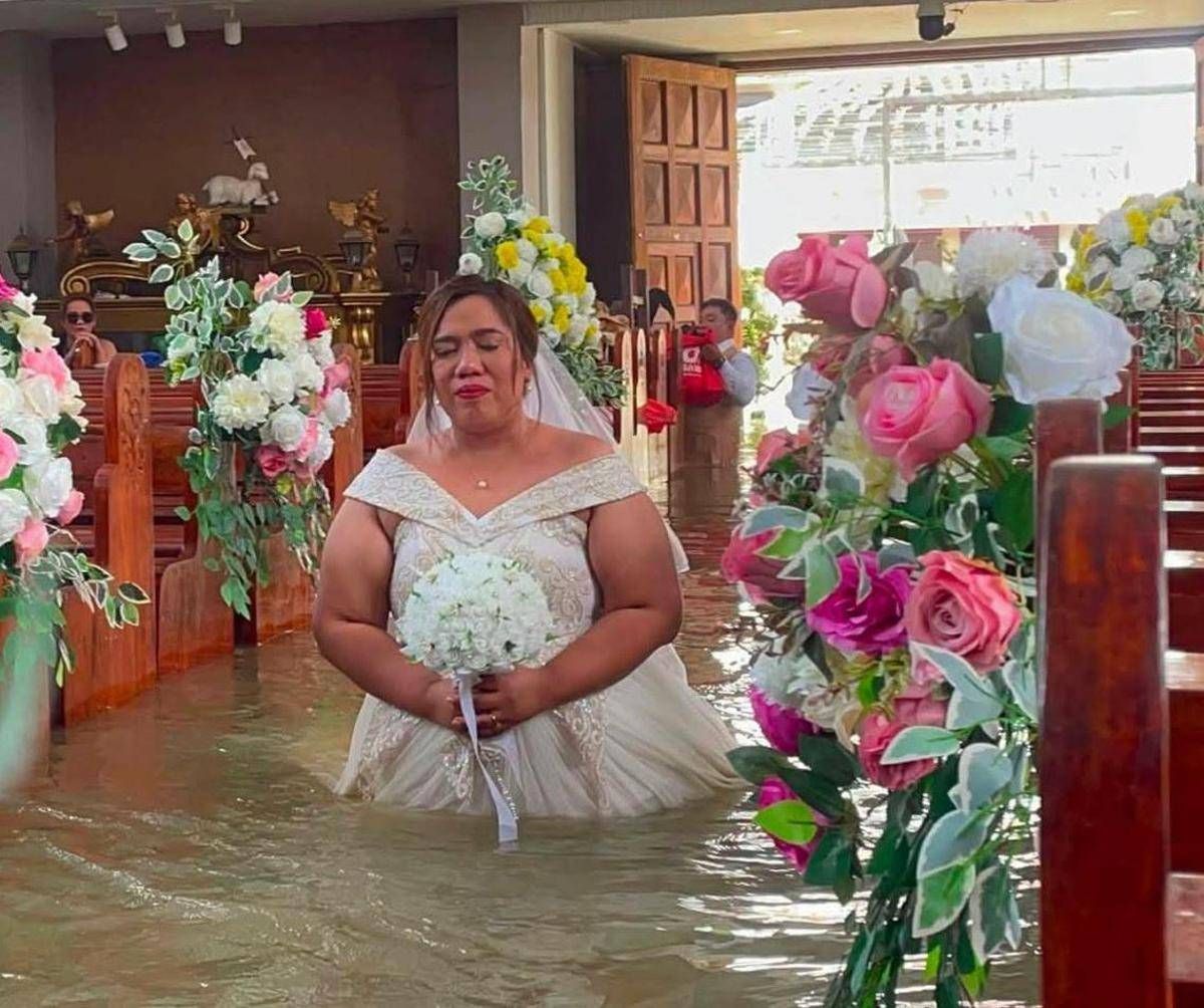 https://www.quotidianodelsud.it/wp-content/uploads/2026/09/filippine-matrimonio-chiesa-allagata-1.jpeg